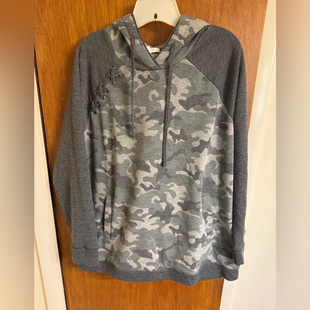 Ladies camouflage hoodie, size XL by Maurices in gently used condition,